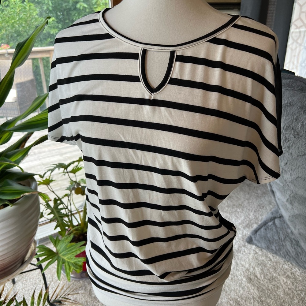 Maurices white top with black vertical stripes sheer back. Size small. NWOT